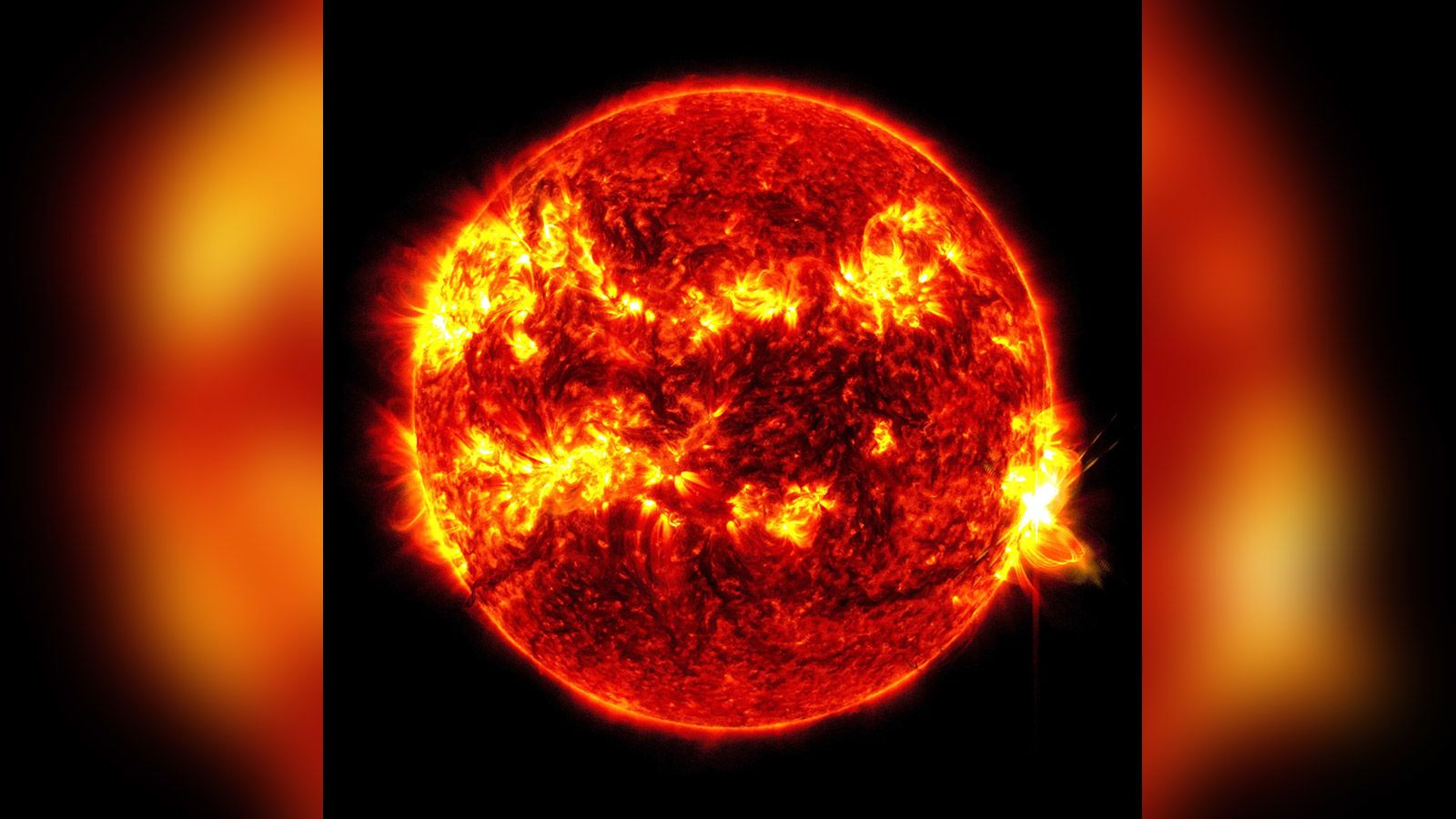 The flash of light pictured on the right side of the Sun was captured by NASA's Solar Dynamics Observatory.