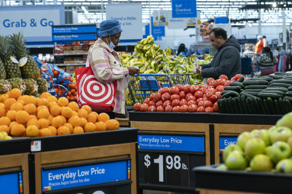 Customers buys vegetables inside the Walmart Supercenter in North Bergen, Thursday, Feb. 9, 2023, in New Jersey. (AP Photo/Eduardo Munoz Alvarez)