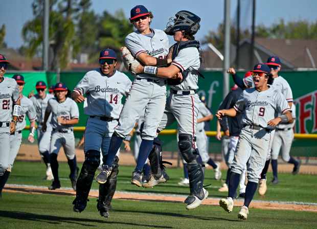 Beckman celebrates their win over Los Alamitos during their CIF-SS...