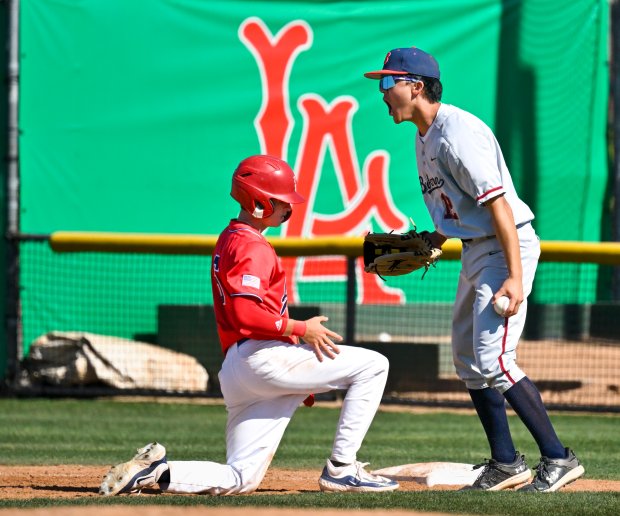 Beckman’s Ethan Rhee (12) reacts after getting Los Alamitos’ Jake...