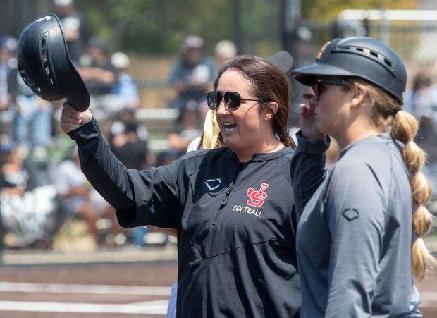 JSerra head coach Katie Stith reacts after a rough inning...