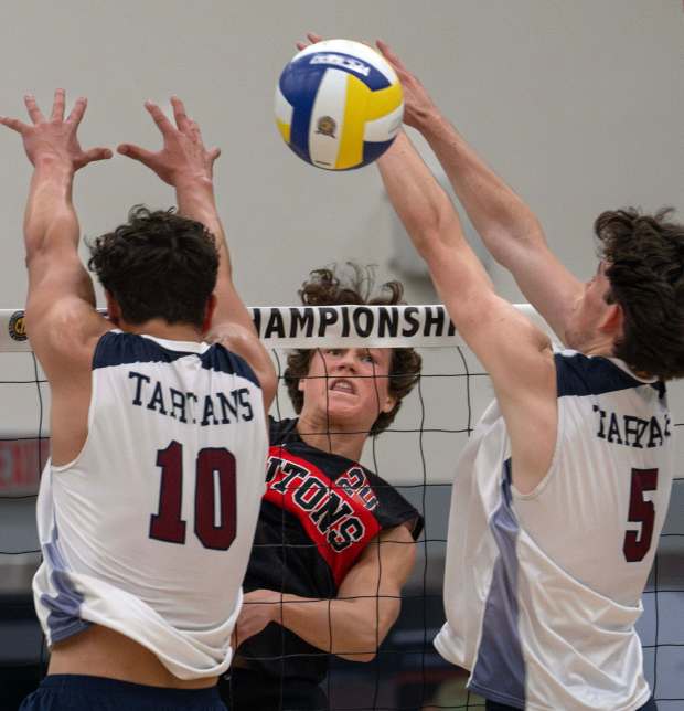 San Clemente's Kai Schmitt (24) sends the ball while St. Margaret's players try to block his shot during the CIF-SS Division 3 boys volleyball championship at Cerritos College in Norwalk on Saturday, May 11, 2024. St. Margaret's won the title. (Photo by Mindy Schauer, Orange County Register/SCNG)