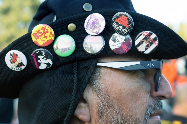 James Lopez of San Jose shows off his pin collection...