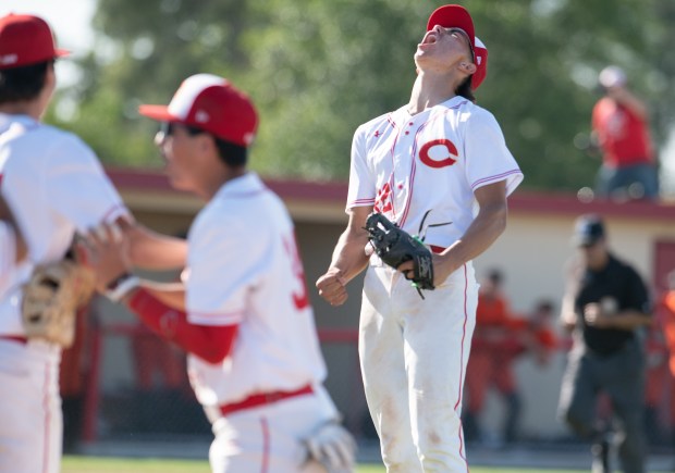 Corona’s Seth Hernandez celebrates after the final out of a...