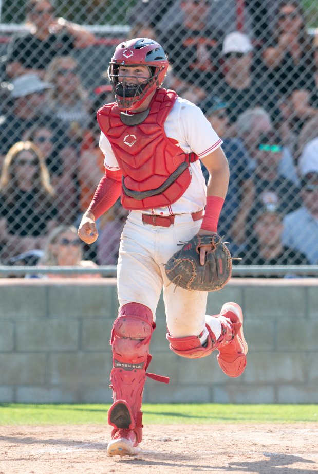 Corona’s Catcher, Josh Springer, in the sixth inning of a...