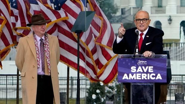 John Eastman (left) stood on stage at a rally in support of President Trump in Washington, D.C. on Jan. 6 while former New York mayor Rudolph Giuliani spoke.JACQUELYN MARTIN/ASSOCIATED PRESS
