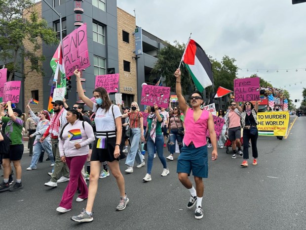 Code Pink Southeast LA marches in the Weho Pride Parade...