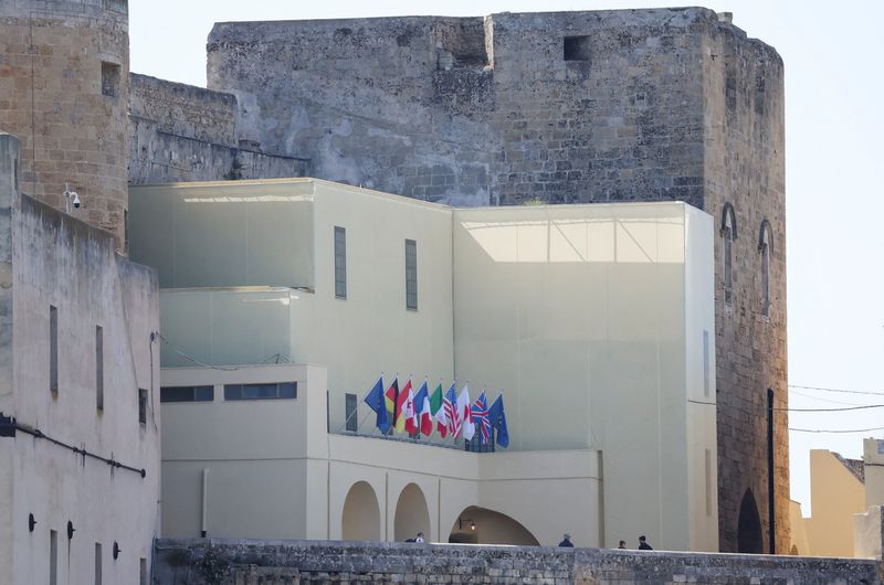 © Reuters. Flags of the G7 nations and the EU are seen at Castello Federiciano, the venue where the G7 summit's first dinner is scheduled to take place on June 13, in Brindisi, Italy, June 11, 2024. REUTERS/Claudia Greco